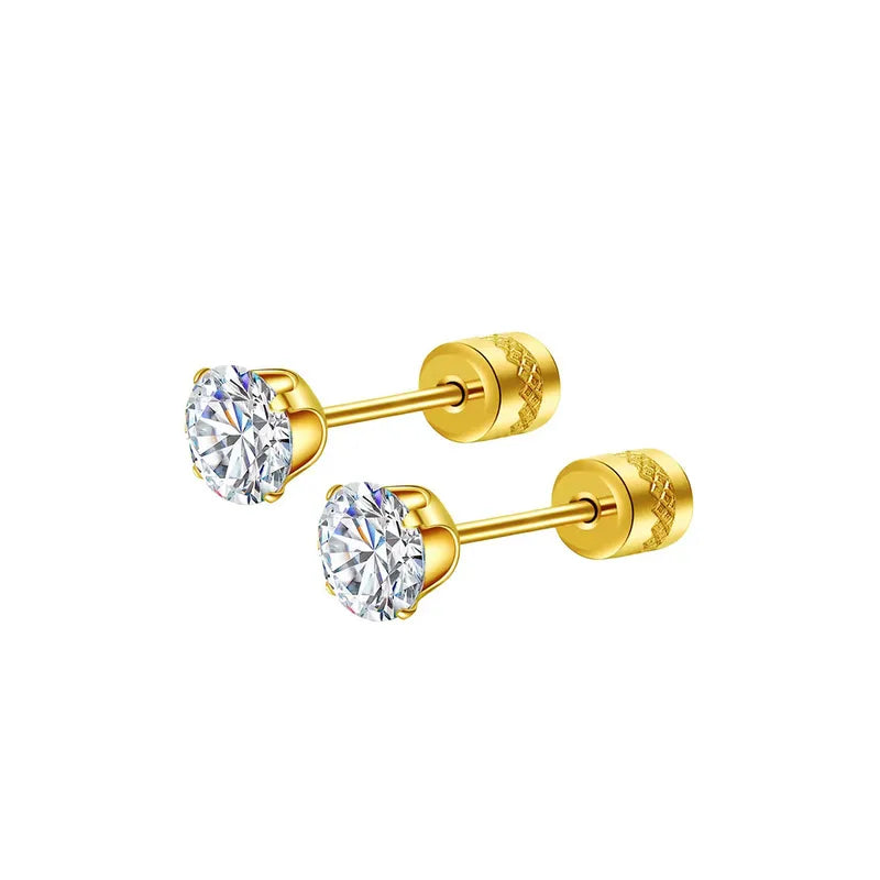 Gold stud earrings with clear gemstones on a white background