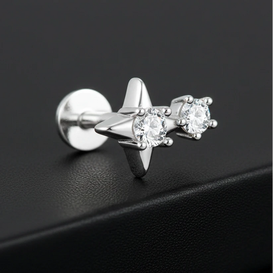 Silver earring with clear gemstones on a white background, featuring a 925 sterling silver stamp.