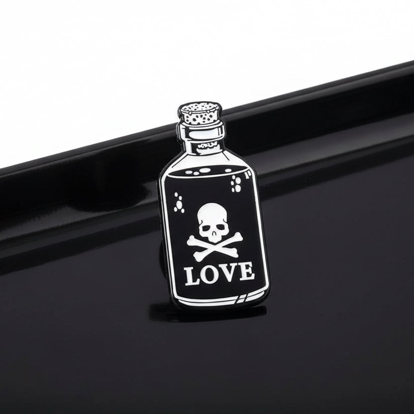 Bottle labeled 'LOVE' with a skull and crossbones on a white background