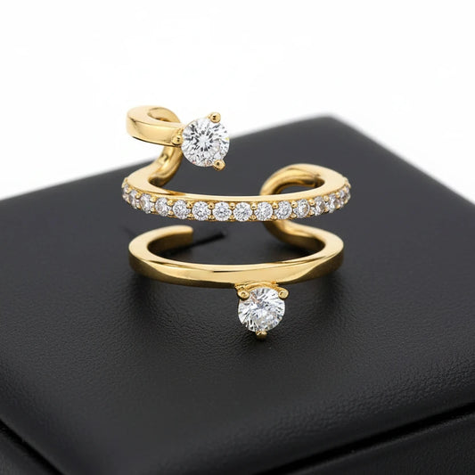 Gold open ring with diamond stones on a white background
